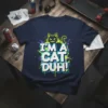 I'm A Cat Duh! humorous quote t-shirt with a stylized black cat graphic and colorful paint splatters
