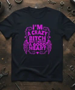 I'm A Crazy Bitch But I Have A Good Heart quote on a black t-shirt with pink distressed typography and