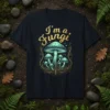 I'm a fungi t-shirt design with a smiling mushroom cluster and golden vine accents