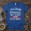 I'm A Grown Woman And I Do What I Want My Dog Wants quote on a blue t-shirt, with paw