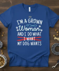 I'm A Grown Woman And I Do What I Want My Dog Wants quote on a blue t-shirt, with paw