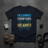 I'm A Gymnast Even My Hands Are Ripped quote on a navy t-shirt with graphics of ripped abs and gymnastics