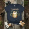T-shirt with watercolor badger saying "I'm A Hugger." surrounded by green leaves, soft style