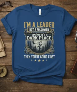 T-shirt with "I'm A Leader Not A Follower" quote and "Dark Place" graphic, dark forest moon scene, bold typography, blue