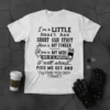White t-shirt with black text quote: "I'm a LITTLE Smart Ass SHORT AND STOUT Here is MY FINGER Here is