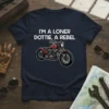 I'm A Loner Dottie, A Rebel t-shirt with a red motorcycle graphic and white text