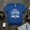 Blue t-shirt with white text "I'M A MULTITASKER. I CAN LISTEN, IGNORE & FORGET ALL AT THE SAME TIME." in