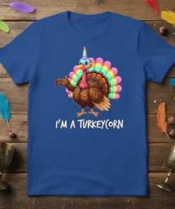 I'm A Turkeycorn t-shirt design featuring a cartoon turkey with a unicorn horn and rainbow tail feathers
