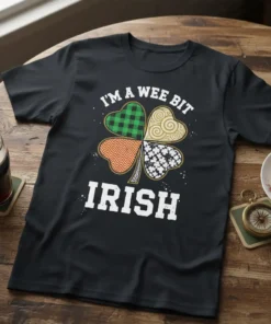 Black t-shirt with "I'm A Wee Bit Irish" text and a four-leaf clover design in various patterns