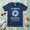 Navy blue t-shirt with "I'm 'Bout to Have a Good Day" quote, a winking sun graphic, and inspirational text about