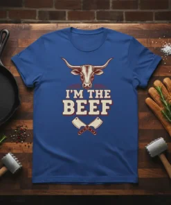 Blue t-shirt with "I'm The Beef" text, a bull's head graphic, and crossed butcher knives