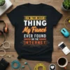 Black t-shirt with white and orange text: "I'm The Best Thing My Fiancé Ever Found On The Internet" in a