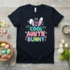 I'm The Cool Auntie Bunny text with bunny ears and Easter eggs graphic on a black t-shirt