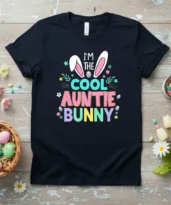 I'm The Cool Auntie Bunny text with bunny ears and Easter eggs graphic on a black t-shirt