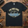 I'm The Cool Uncle text with sunglasses and wings graphic on a black t-shirt