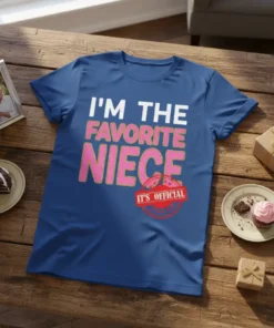 Blue t-shirt with white and pink text that reads "I'M THE FAVORITE NIECE IT'S OFFICIAL" in a fun font