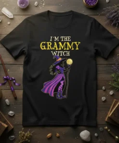 I'm the Grammy Witch text with a witch graphic on a black t-shirt