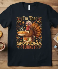 I'm The Grandma Turkey text with a cute turkey character holding a pie, surrounded by autumn leaves and cookies
