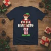 Navy blue t-shirt with "I'm The Handsome Elf" text and cartoon elf graphic, festive holiday design