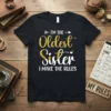Black t-shirt with white and gold glitter text: "i'm THE Oldest Sister i MAKE THE RULES"