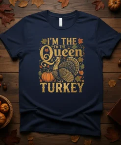 I'm The Queen Turkey Thanksgiving t-shirt design featuring a regal turkey, crown, pumpkin, and autumn leaves