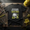 Black t-shirt with white and yellow text "I'm The Reason For The Company Safety Video" and a graphic of a