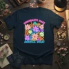 Immigrants Make America Great text with colorful floral and landmark graphics on a navy t-shirt