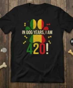 Black t-shirt with "In Dog Years, I Am 420!" text, paw print graphic, and dog bone accents