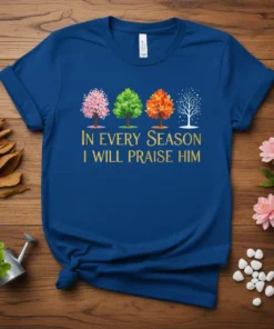 Christian T-Shirt with text "In EVERY SEASON I WILL PRAISE HIM" and four seasonal trees: spring, summer, autumn, winter