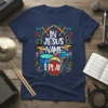 In Jesus Name I Play t-shirt featuring a drum set, drumsticks, and speakers with colorful accents