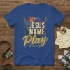Christian t-shirt with "In Jesus Name Play" text, guitars, musical notes, and a cross graphic