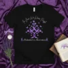 Black t-shirt with "In June We Wear Purple" text, a tree graphic with purple ribbons and butterflies, and "Alzheimer's Awareness"