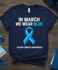 Navy t-shirt with "In March We Wear Blue" text and a blue colon cancer awareness ribbon, plus "Colon Cancer Awareness"