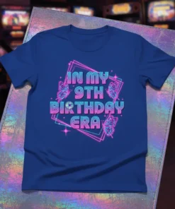 In My 9th Birthday Era t-shirt with neon pink and blue design and butterflies