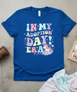 In My Adoption Day! Era t-shirt with a retro font and a cute unicorn on clouds