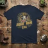In My Aggie Mom Era t-shirt featuring a cartoon cowgirl with a cowboy hat and cowboy boots, with text "IN