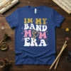In My Band Mom Era text design with musical notes and heart graphic on a blue t-shirt