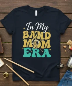 In My Band Mom ERA text with musical treble clef graphic on a dark t-shirt