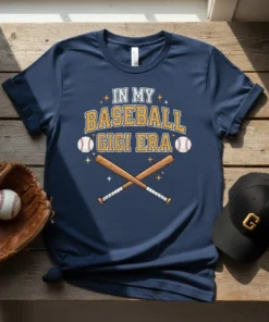 Navy t-shirt with "In My Baseball Gigi Era" text, baseballs, and crossed bats graphic