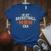 In My Basketball Mom Era text with basketball graphic on a blue t-shirt, perfect for sports moms