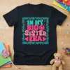 In My Big Sister Era text design with smiley face and decorative border on a black t-shirt