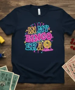 Retro neon t-shirt design that says "IN MY BINGO ERA" with a bingo cage graphic