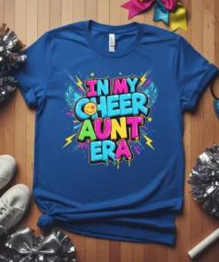 In My Cheer Aunt Era text with wings and smiley face graphic on a blue t-shirt