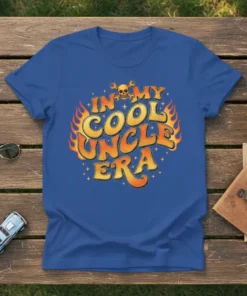 In My Cool Uncle Era text design with flames and skull graphic on a blue t-shirt