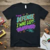Black t-shirt with colorful graffiti text "In My Defense I Was Left Unsupervised" for a humorous adult quote design