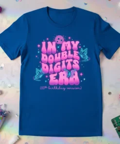 In My Double Digits Era (10th birthday version) text with retro font and butterfly graphics on a blue t-shirt