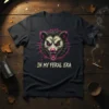 In My Feral Era t-shirt with a fierce raccoon graphic and neon pink accents, bold typography
