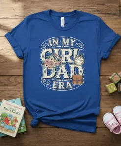 In My Girl Dad Era text with floral graphics and a briefcase on a blue t-shirt