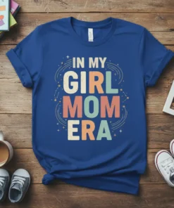 In My Girl Mom Era text design with playful stars and constellations, featuring pastel colored letters on a blue t-shirt