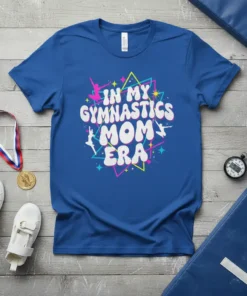 In My Gymnastics Mom Era text with graphic elements and silhouettes of gymnasts on a blue t-shirt